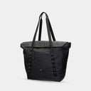 All-black waterproof tote for photographers and creatives. Converts from work to weekend mode.